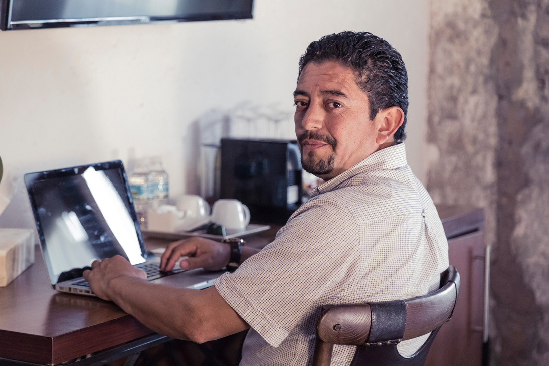 Middle Aged Latin Man Working, Business Concept